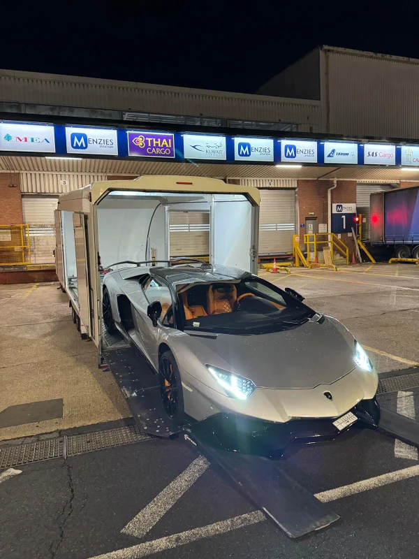 silver-ferrari-towing-in-london