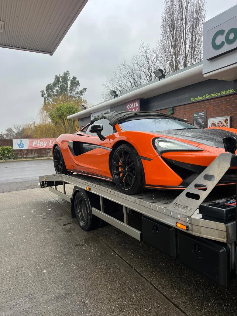 Supercar recovery McLaren Flatbed transport London Uk