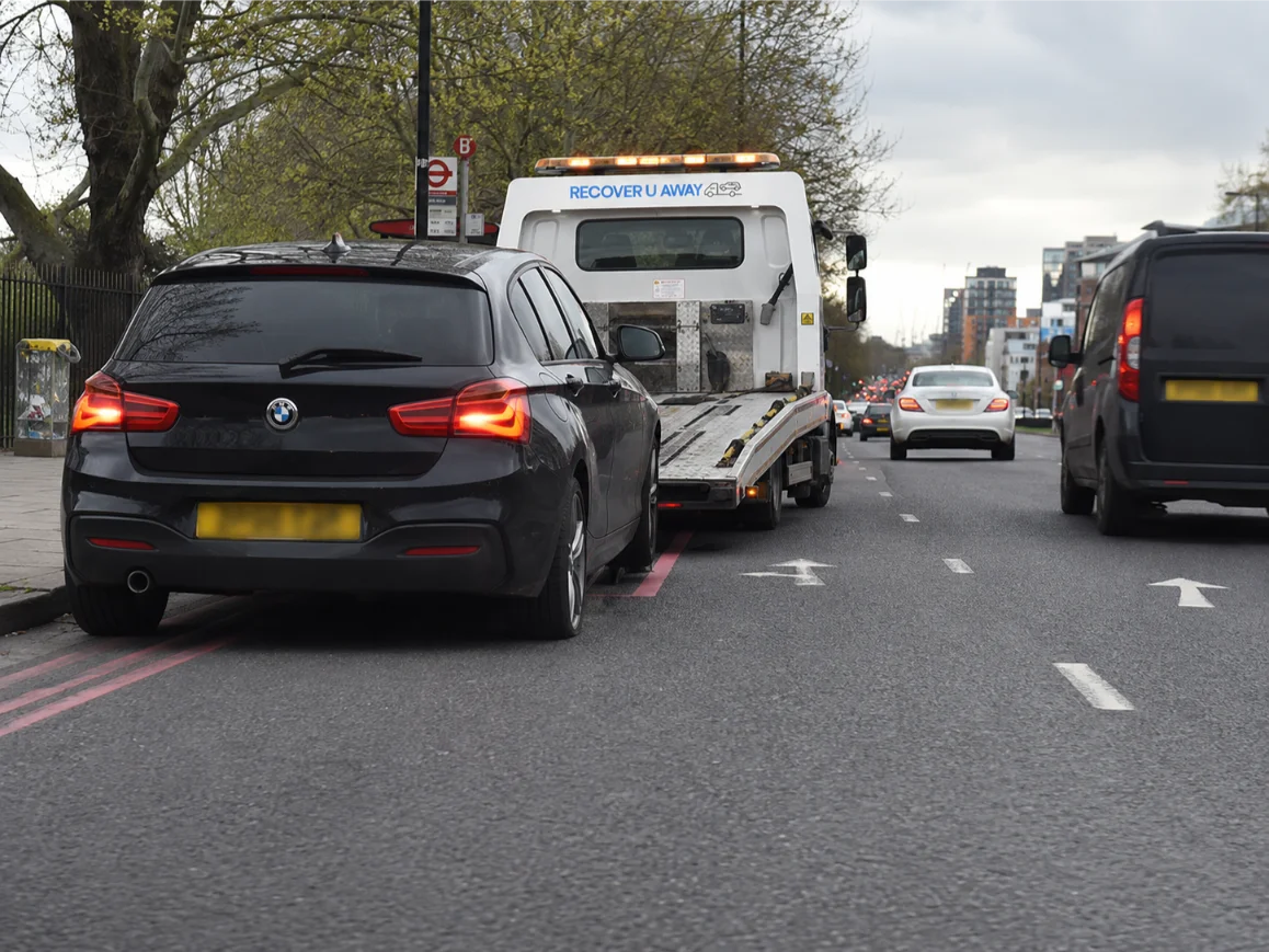 BMW 1 Series emergency towing on the A118 in London